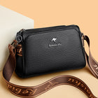 Multi-Compartment Leather Crossbody Bag with Designer Strap