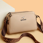 Multi-Compartment Leather Crossbody Bag with Designer Strap