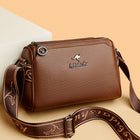 Multi-Compartment Leather Crossbody Bag with Designer Strap